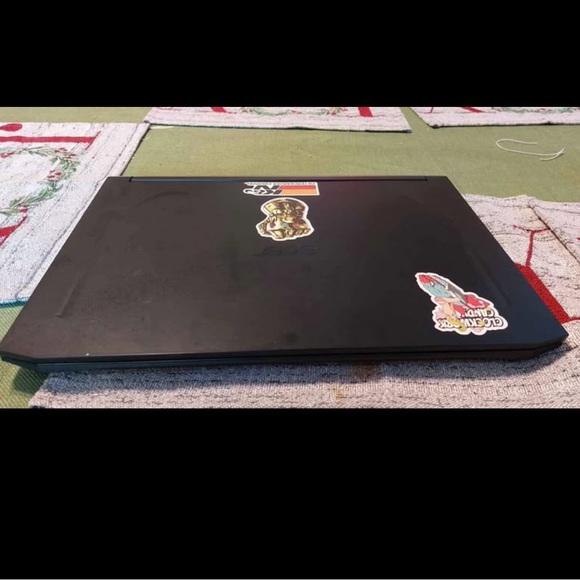 Sleek Black Laptop with Modern Design and Matte Finish acer...